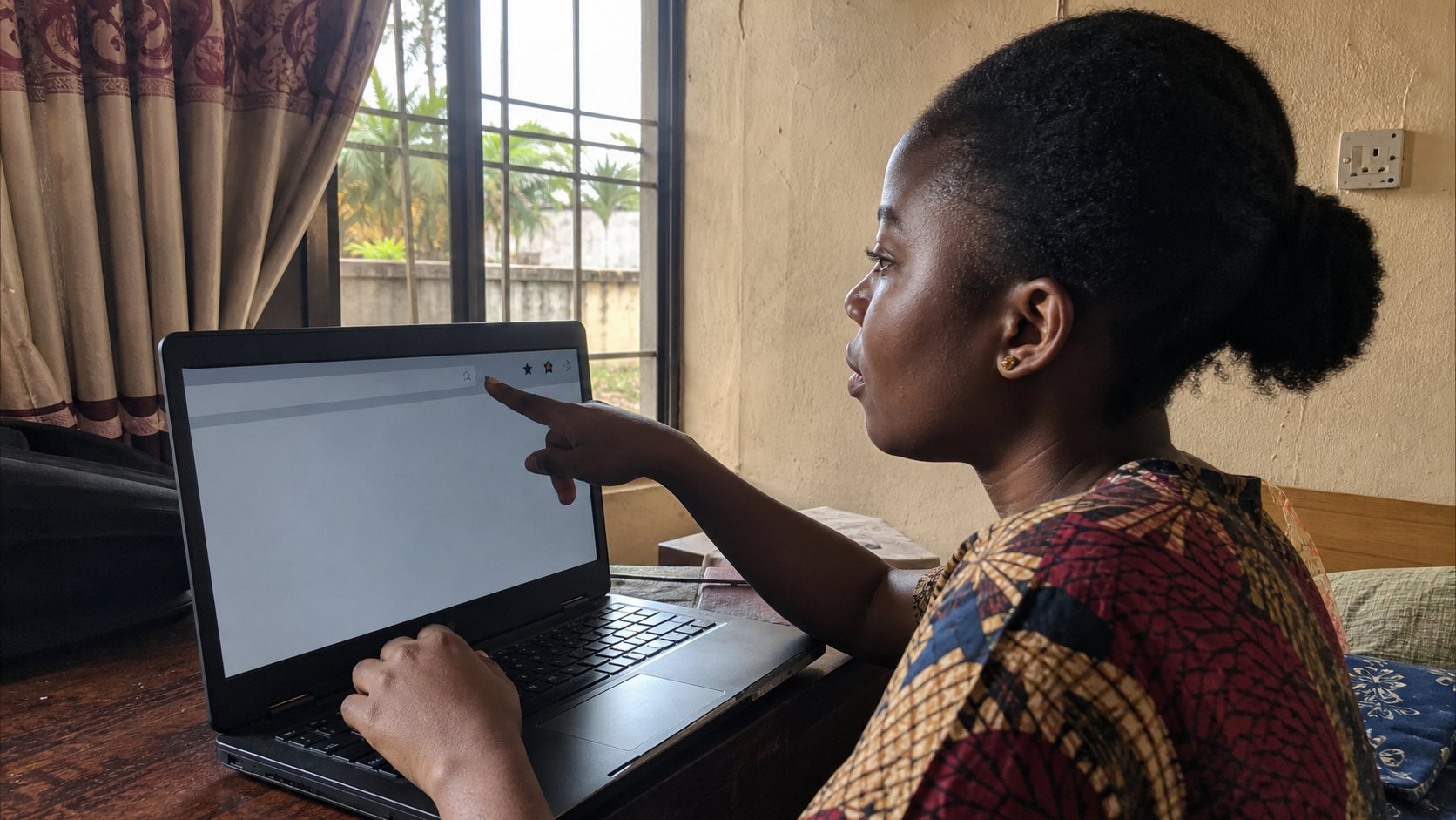 A young woman clicking the star in a browser.
