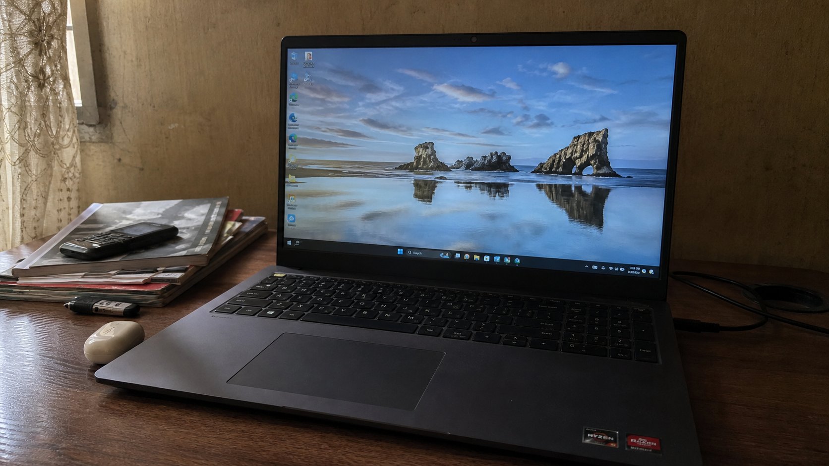 A laptop desktop with a few shortcut icons.