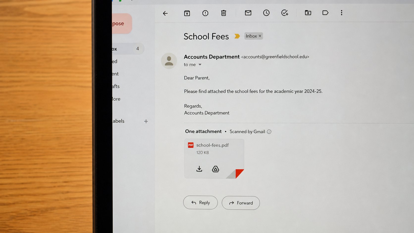 An email with a paperclip attachment icon and a PDF named school-fees.pdf.