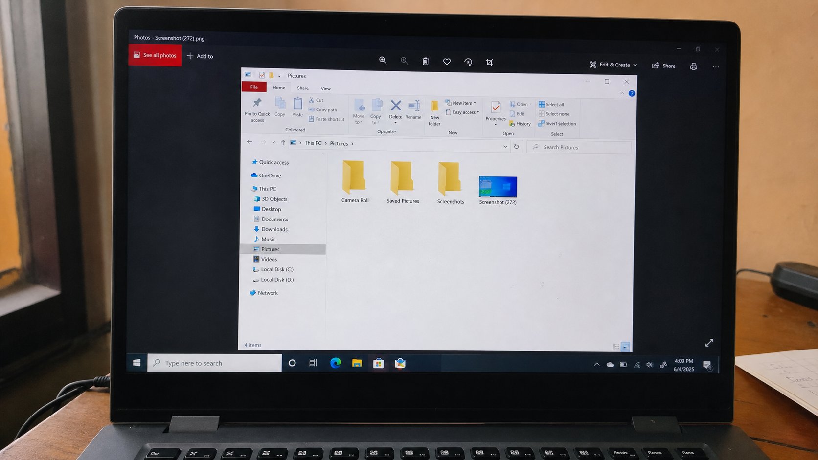 A screenshot image sitting in a Pictures folder on a laptop.
